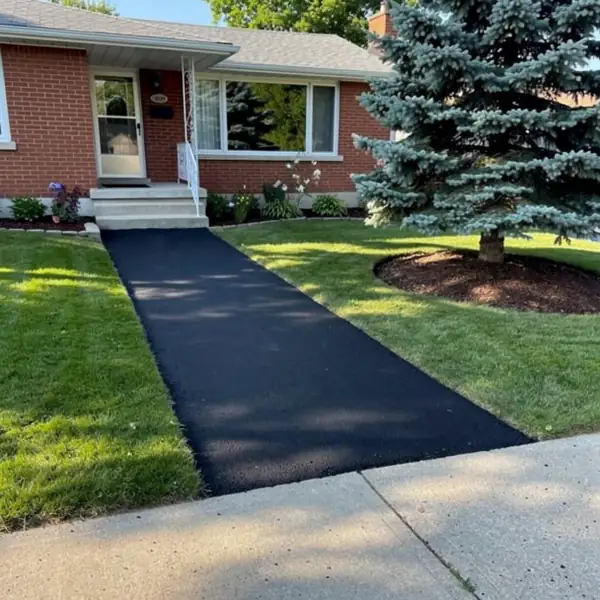 Asphalt front walkway to bungalow porch Asphalt front walkway to bungalow porch