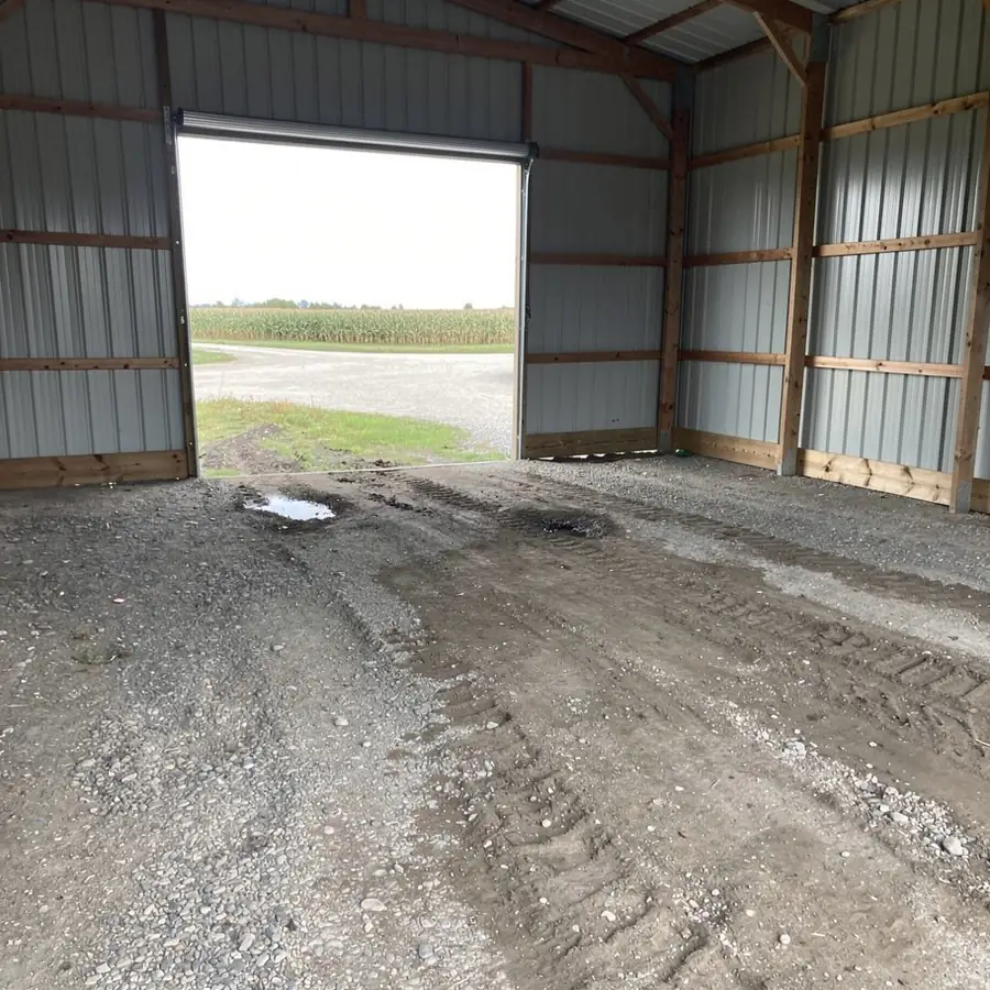 Gravel floor inside pole barn before paving