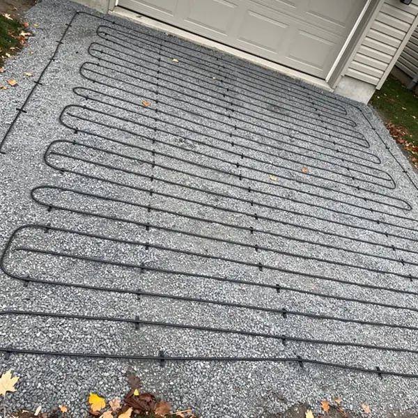 Heating cables laid before asphalt paving