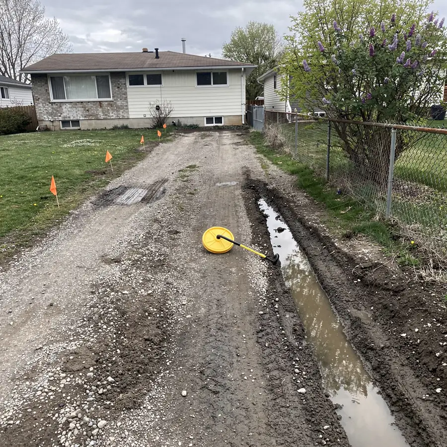 Old gravel driveway measured for paving