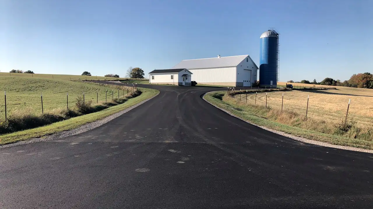 Paved farm lane by Wellesley dairy barn Paved farm lane by Wellesley dairy barn